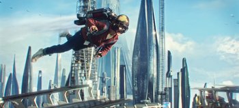 Movie still from “Tomorrowland” (2015), directed by Brad Bird – A man flying through the air while riding a jetpack; Wide shot, Low angle