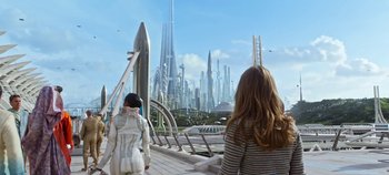 Movie still from “Tomorrowland” (2015), directed by Brad Bird – Two women are looking at a futuristic city; Extreme Wide shot, High angle