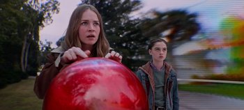 Movie still from “Tomorrowland” (2015), directed by Brad Bird – Two young people standing next to each other; Medium shot, Low angle