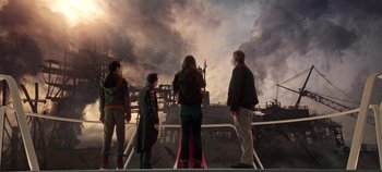 Movie still from “Tomorrowland” (2015), directed by Brad Bird – A group of people standing in front of a building; Wide shot, Low angle