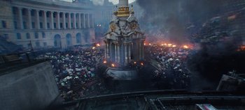 Movie still from “Tomorrowland” (2015), directed by Brad Bird – An aerial view of a large crowd of people in a city; Extreme Wide shot, Overhead angle