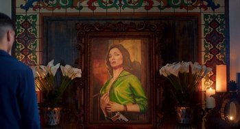 Movie still from “Too Old to Die Young” (2019), directed by Nicolas Winding Refn – A painting of a woman in a green shirt; Medium shot, Low angle