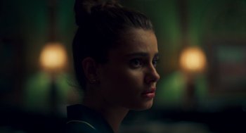 Movie still from “Too Old to Die Young” (2019), directed by Nicolas Winding Refn – A person looking to the side; Close Up shot, Over the shoulder angle