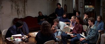 Movie still from “Tootsie” (1982), directed by Sydney Pollack – A group of people sitting in a room talking to each other; Wide shot, High angle