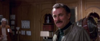 Movie still from “Tootsie” (1982), directed by Sydney Pollack – A person with a mustache; Close Up shot, Low angle