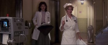 Movie still from “Tootsie” (1982), directed by Sydney Pollack – Two women dressed as nurses in a hospital room; Medium shot, Low angle