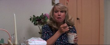 Movie still from “Tootsie” (1982), directed by Sydney Pollack – A woman is holding a cup of coffee; Close Up shot, Over the shoulder angle