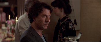 Movie still from “Tootsie” (1982), directed by Sydney Pollack – A person wearing a suit and tie; Close Up shot, Over the shoulder angle