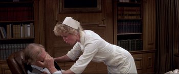 Movie still from “Tootsie” (1982), directed by Sydney Pollack – A woman in a nurse's uniform bending over; Medium shot, Low angle