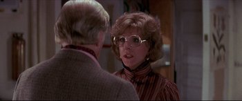 Movie still from “Tootsie” (1982), directed by Sydney Pollack – An older woman wearing glasses talking to a younger man; Close Up shot, Over the shoulder angle
