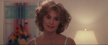 Movie still from “Tootsie” (1982), directed by Sydney Pollack – A person wearing a necklace; Close Up shot, Over the shoulder angle