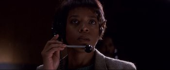 Movie still from “Tootsie” (1982), directed by Sydney Pollack – A woman holding a phone up to her ear; Close Up shot, Low angle