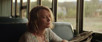 Movie still from “Tracks” (2013), directed by John Curran – A woman sitting in a chair looking out a window; Close Up shot, Low angle