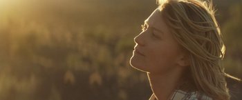 Movie still from “Tracks” (2013), directed by John Curran – A person with her eyes closed; Close Up shot, Low angle