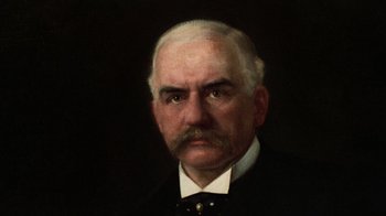 Movie still from “Trading Places” (1983), directed by John Landis – An older man with a mustache and a mustache comb; Close Up shot, Low angle