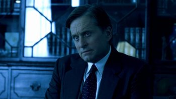 Movie still from “Traffic” (2000), directed by Steven Soderbergh – A man in a suit and tie; Close Up shot, Low angle