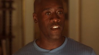 Movie still from “Traffic” (2000), directed by Steven Soderbergh – A man's face in a room; Close Up shot, High angle