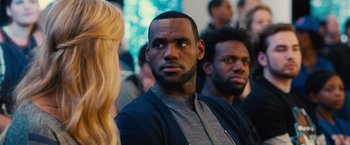 Movie still from “Trainwreck” (2015), directed by Judd Apatow – A person with a beard; Close Up shot, Over the shoulder angle