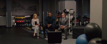 Movie still from “Trainwreck” (2015), directed by Judd Apatow – A group of people sitting in a room with drinks; Wide shot, Over the shoulder angle