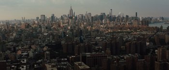 Movie still from “Trainwreck” (2015), directed by Judd Apatow – A view of a large city from a high point; Extreme Wide shot, High angle