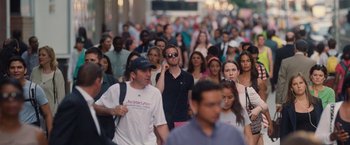 Movie still from “Trainwreck” (2015), directed by Judd Apatow – A crowd of people walking down a street; Wide shot, High angle