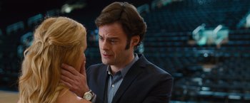 Movie still from “Trainwreck” (2015), directed by Judd Apatow – A man and a woman are looking at one another; Close Up shot, Over the shoulder angle