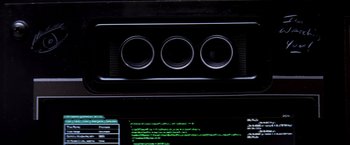 Movie still from “Transcendence” (2014), directed by Wally Pfister – View of a computer monitor; Extreme Close Up shot, Overhead angle