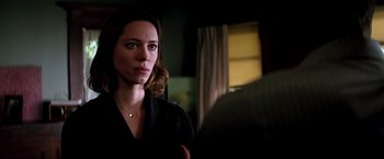 Movie still from “Transcendence” (2014), directed by Wally Pfister – A person looking at the camera; Close Up shot, Over the shoulder angle