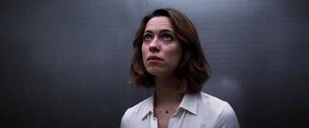 Movie still from “Transcendence” (2014), directed by Wally Pfister – A person wearing a white shirt; Close Up shot, Low angle