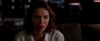 Movie still from “Transcendence” (2014), directed by Wally Pfister – A person wearing a white shirt; Close Up shot, Over the shoulder angle