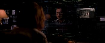 Movie still from “Transcendence” (2014), directed by Wally Pfister – A man and a woman looking at each other through a window; Close Up shot, Over the shoulder angle