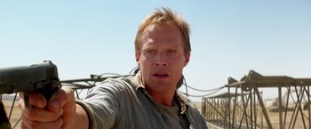 Movie still from “Transcendence” (2014), directed by Wally Pfister – A person with a camera; Close Up shot, Low angle