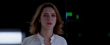 Movie still from “Transcendence” (2014), directed by Wally Pfister – A person wearing a white shirt; Close Up shot, Low angle