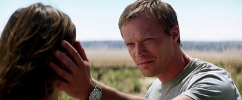 Movie still from “Transcendence” (2014), directed by Wally Pfister – A person with a watch; Close Up shot, Over the shoulder angle