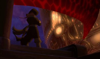 Movie still from “Treasure Planet” (2002), directed by John Musker – A man in a black coat and hat standing next to a red wall; Wide shot, Low angle