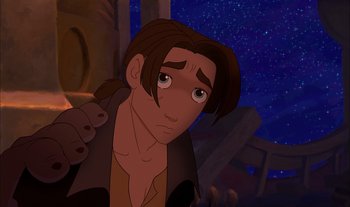 Movie still from “Treasure Planet” (2002), directed by John Musker – A man with long brown hair is looking at the camera; Close Up shot, Low angle