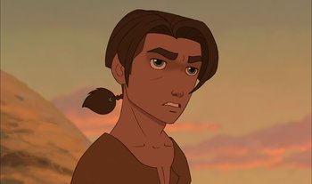 Movie still from “Treasure Planet” (2002), directed by John Musker – A man with long brown hair is looking at the camera; Close Up shot, Over the shoulder angle
