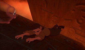 Movie still from “Treasure Planet” (2002), directed by John Musker – An animated man laying on the ground in front of a fire; Wide shot, Overhead angle