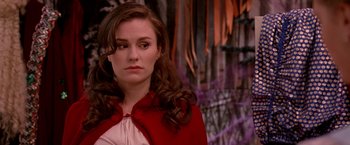 Movie still from “Trick 'r Treat” (2007), directed by Michael Dougherty – A young woman in a red and white dress; Close Up shot, Over the shoulder angle
