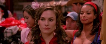 Movie still from “Trick 'r Treat” (2007), directed by Michael Dougherty – A person with long hair; Close Up shot, Over the shoulder angle