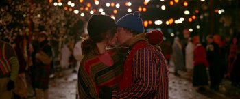 Movie still from “Trick 'r Treat” (2007), directed by Michael Dougherty – A couple of people that are kissing in the street; Medium shot, Over the shoulder angle