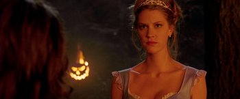 Movie still from “Trick 'r Treat” (2007), directed by Michael Dougherty – A beautiful young woman wearing a tiara and a crown; Close Up shot, Over the shoulder angle