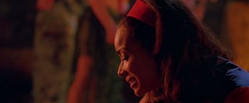 Movie still from “Trick 'r Treat” (2007), directed by Michael Dougherty – A person wearing a red hat; Close Up shot, Over the shoulder angle