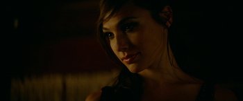 Movie still from “Triple 9” (2016), directed by John Hillcoat – A woman's face in the dark; Close Up shot, Over the shoulder angle