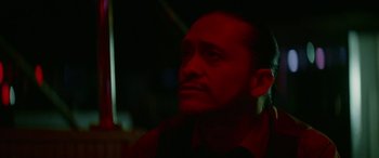 Movie still from “Triple 9” (2016), directed by John Hillcoat – A person looking up at the sky; Close Up shot, Low angle