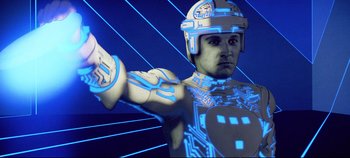 Movie still from “Tron” (1982), directed by Steven Lisberger – An image of a man with a helmet on his head; Close Up shot, Low angle