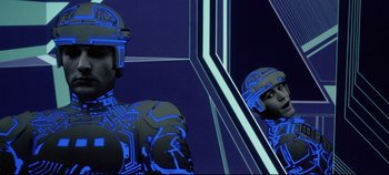Movie still from “Tron” (1982), directed by Steven Lisberger – A man with a helmet is reflected in a mirror; Close Up shot, Low angle