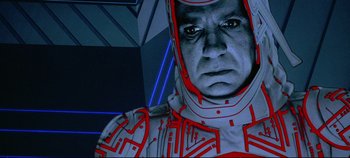 Movie still from “Tron” (1982), directed by Steven Lisberger – An image of a man in a futuristic costume; Close Up shot, Low angle