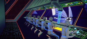 Movie still from “Tron” (1982), directed by Steven Lisberger – A group of people sitting in a room with neon lights; Wide shot, High angle