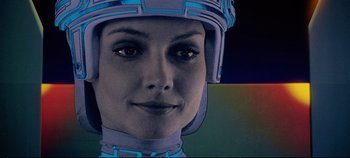 Movie still from “Tron” (1982), directed by Steven Lisberger – A person wearing a helmet; Close Up shot, Low angle
